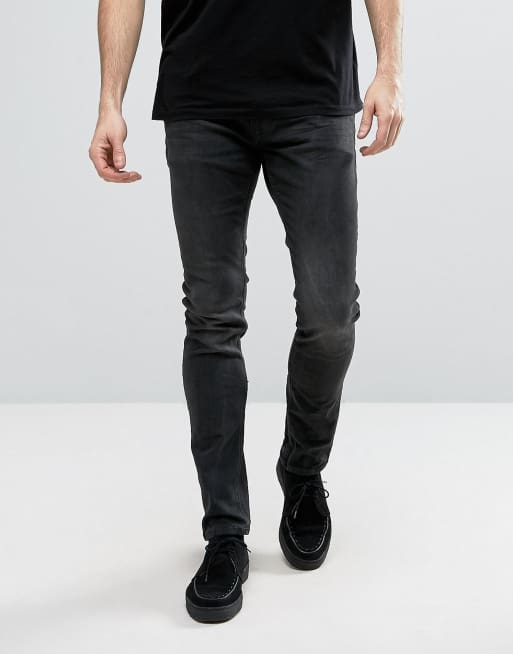 AllSaints Jeans in Skinny Fit Black with Aged Knee