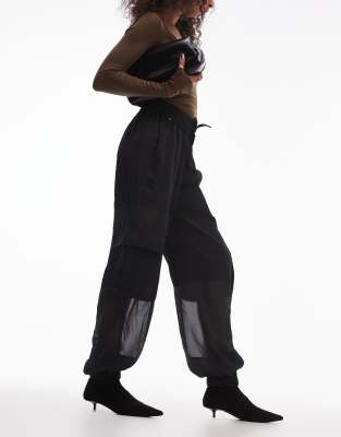 Универсальные брюки из сетчатого атласа AllSaints Jody черного цвета 47590₽