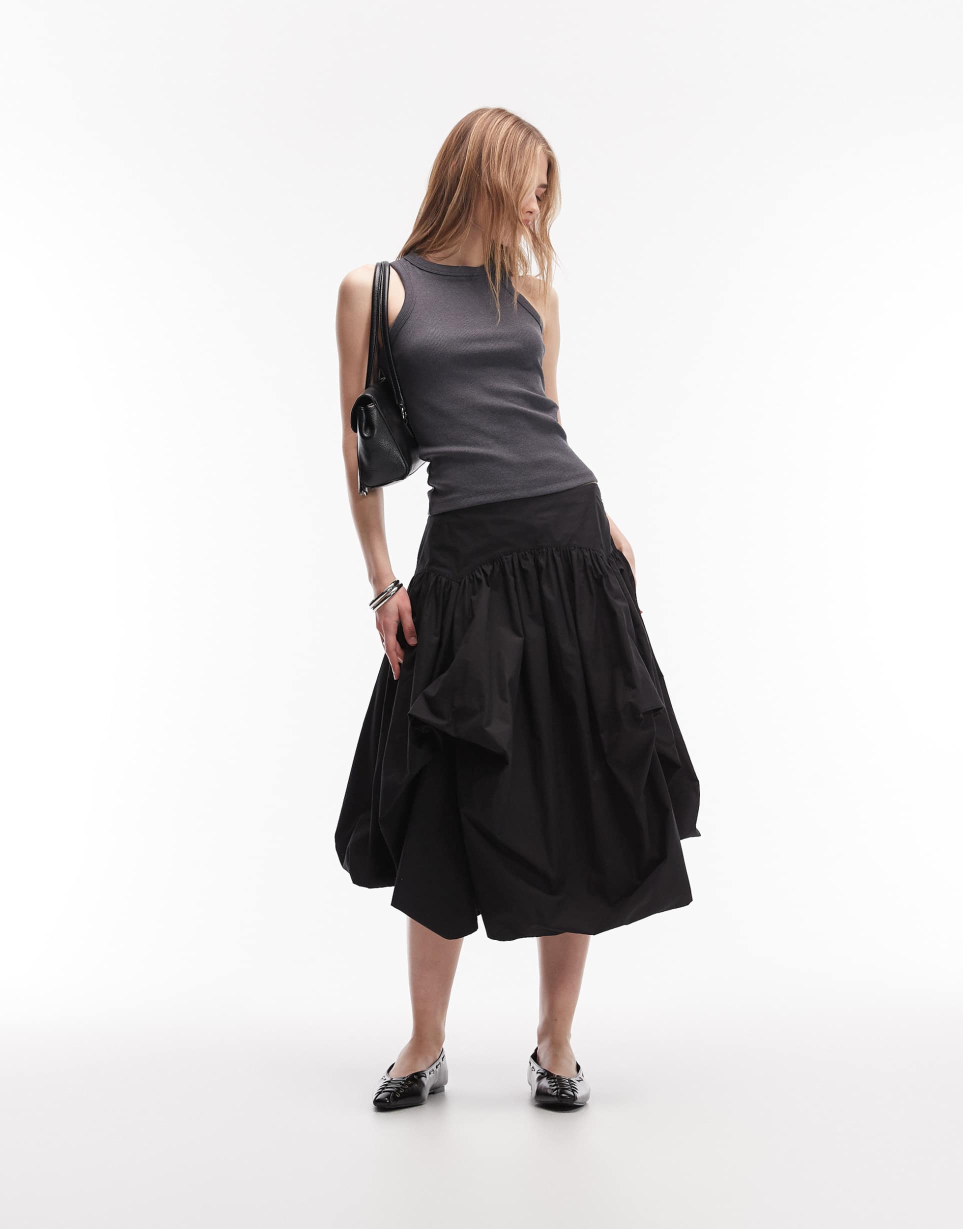 allsaints juniper dropped waist asymmetric volume midi skirt in black