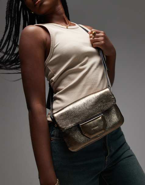 AllSaints Jupiter crossbody bag in gold - view 1