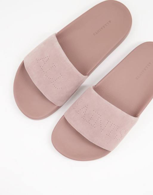 AllSaints Karli suede pool sliders with logo in blush pink ASOS