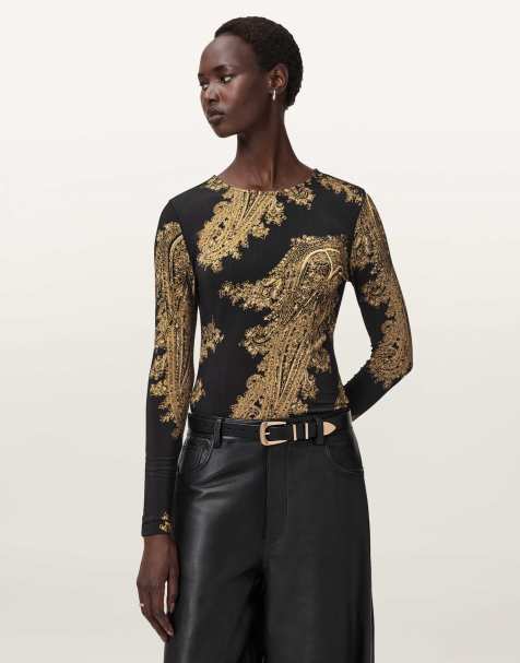 AllSaints Katlyn printed long sleeve top in black and gold - view 1