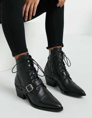 bottes noires homme talon haut