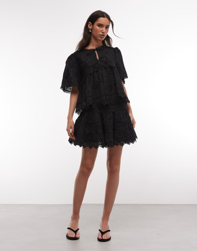 AllSaints Lillith co-ord broderie ruffle mini skirt in black | ASOS