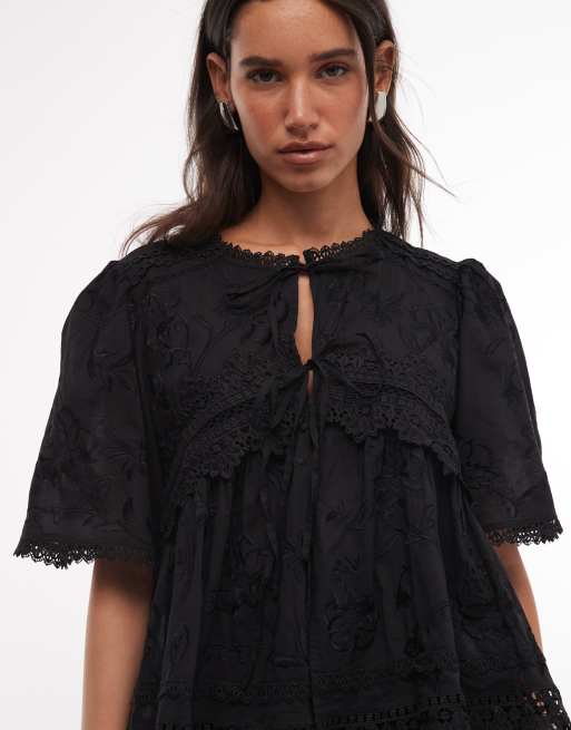 AllSaints Lillith short sleeve tie up frilly lace blouse in black, 2 of 4