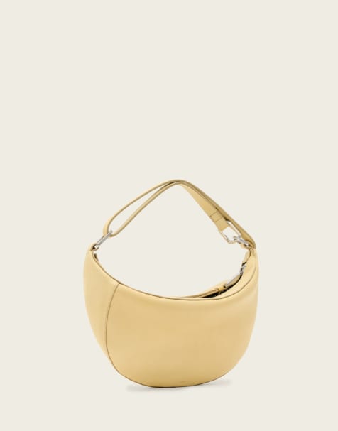 AllSaints – Luna – Kleine Tasche in Sanftgelb - view 1