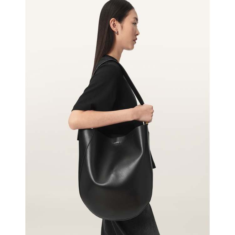 AllSaints Luna lambs leather bucket bag in black | ASOS