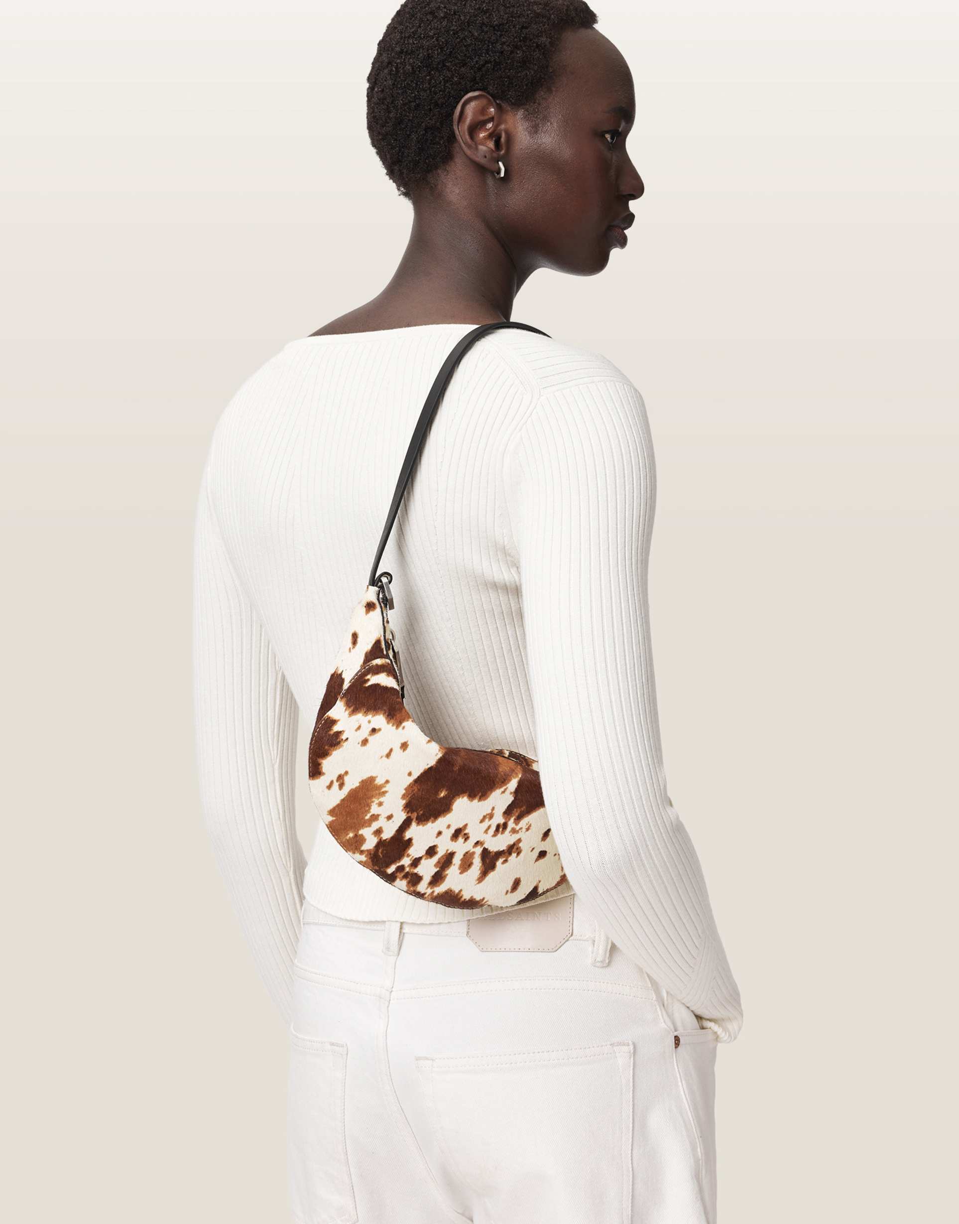 allsaints luna micro shoulder bag in cow print