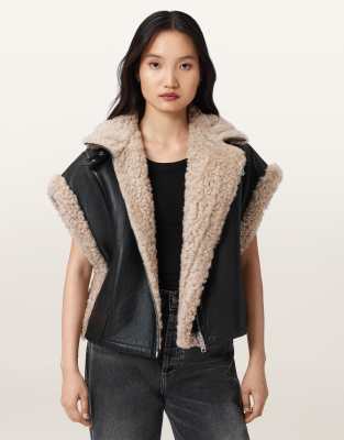 AllSaints - Marlin - Weste in Schwarz/Natur mit Lammfell