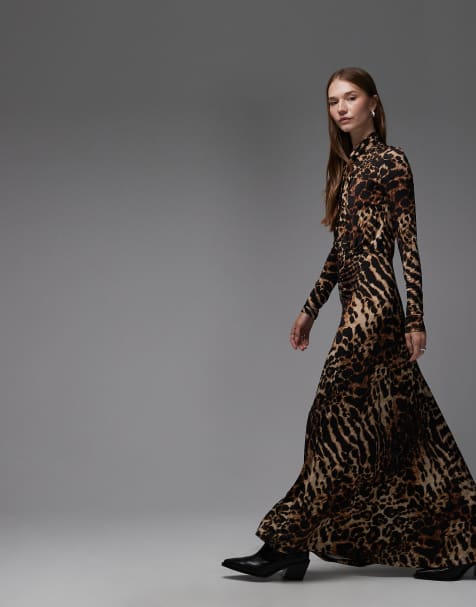 AllSaints – Mina – Langärmliges Maxikleid in Schwarz und Gold mit Print - view 1
