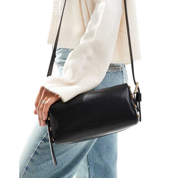 AllSaints Miro leather barrel crossbody bag in black ASOS