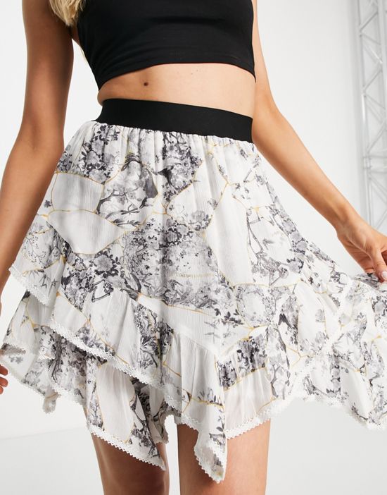 https://images.asos-media.com/products/allsaints-nico-buruberu-mini-skirt-in-white/202067806-1-white?$n_550w$&wid=550&fit=constrain