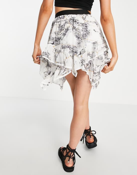 https://images.asos-media.com/products/allsaints-nico-buruberu-mini-skirt-in-white/202067806-2?$n_550w$&wid=550&fit=constrain