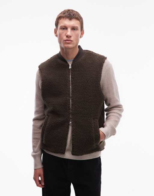 AllSaints – Otis – Teddyfell-Weste in Grün mit Logo 
