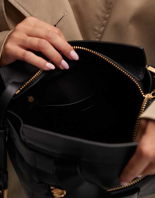 AllSaints Perez leather mini crossbody bag in black | ASOS