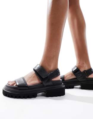 AllSaints - Rory - Ledersandalen in Schwarz mit flacher Plateausohle