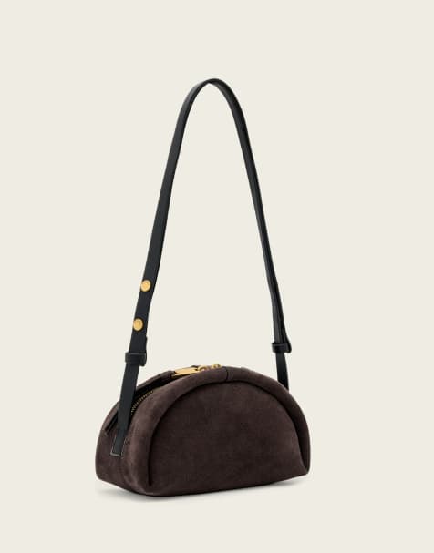AllSaints Rosalie Arc suede leather crossbody bag in dark brown - view 1