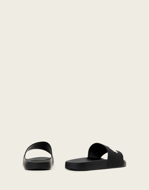 AllSaints - Sandalias negras con logo Saints & Sinners, 2 de 4