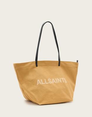 AllSaints - Serafina - Tragetasche aus Canvas in Palisaden-Hellbraun