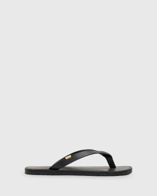 AllSaints - Sydney - Zehenstegsandalen aus Leder in Schwarz