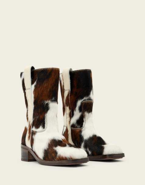 AllSaints terri cow print mid length boots in cream - view 1