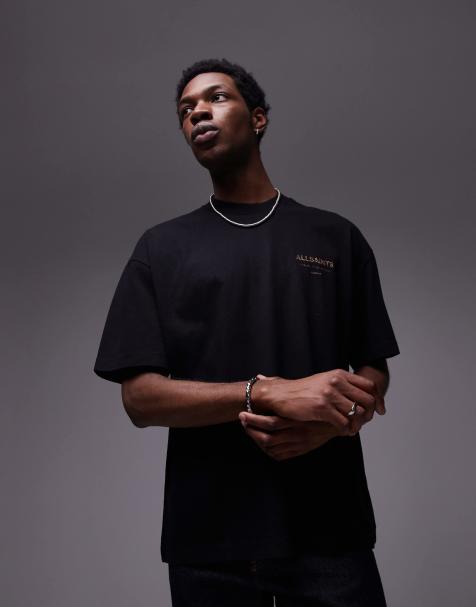AllSaints – Underground – Czarny T-shirt oversize z nadrukiem we wzór skóry węża - view 1