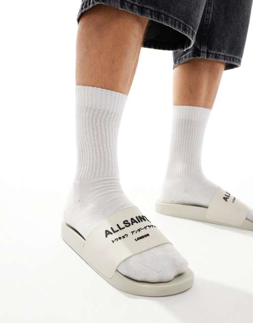 AllSaints Underground rubber slides in white