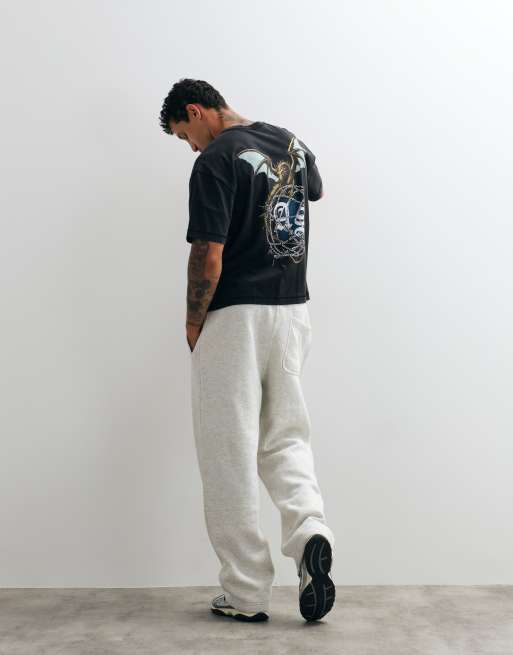 AllSaints Wyvern short sleeve graphic logo t-shirt with back print in washed black, 2 of 5