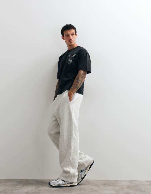 AllSaints Wyvern short sleeve graphic logo t-shirt with back print in washed black, 5 of 5