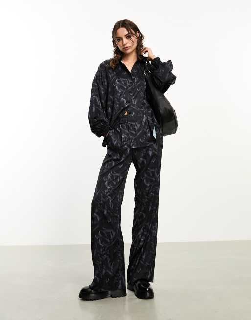 AllSaints x ASOS exclusive Charli satin pants in black (part of a set)