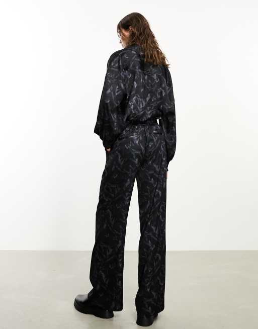 AllSaints x ASOS exclusive Charli satin pants in black - part of a set
