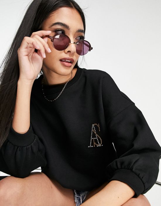 https://images.asos-media.com/products/allsaints-x-asos-exclusive-imogen-loves-you-wing-oversized-sweatshirt-in-black/202064643-2?$n_550w$&wid=550&fit=constrain