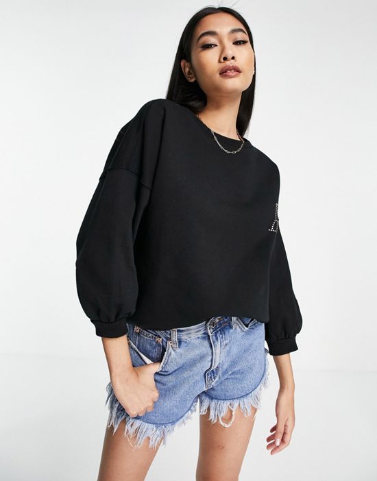 https://images.asos-media.com/products/allsaints-x-asos-exclusive-imogen-loves-you-wing-oversized-sweatshirt-in-black/202064643-4?$n_550w$&wid=550&fit=constrain