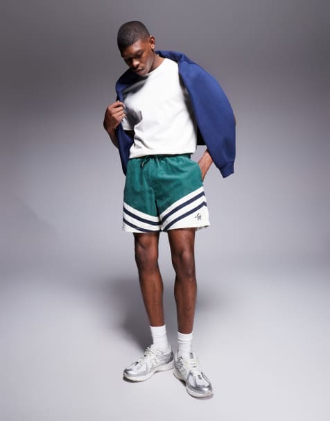 Alma De Ace logo shorts in green color block - view 1