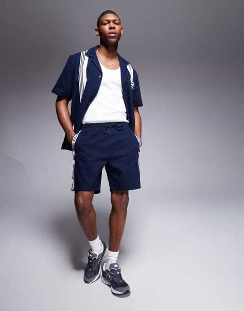 Alma de Ace - Pantaloncini in maglia blu navy con righe e logo in coordinato - view 1