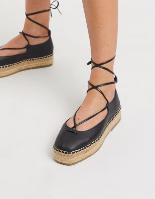 Alpargatas de cuero en negro con detalle anudado en la pierna Jenny de ASOS DESIGN |