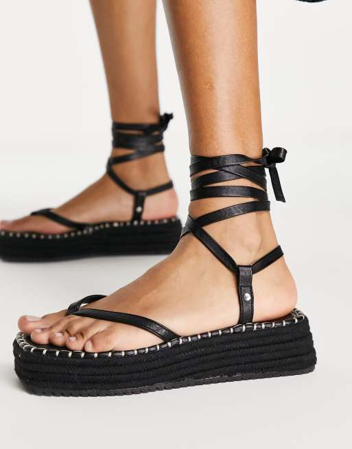 Alpargatas negras con plataforma plana ASOS DESIGN | ASOS