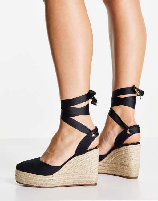 Mes Consejo a la deriva Alpargatas negras de cuña con puntera cerrada Vertigo de Schuh | ASOS