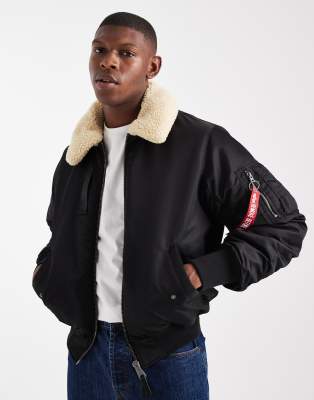 Alpha Industries - B-15 - Unisex-Bomberjacke in Schwarz mit Teddyfellkragen