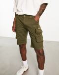 Alpha Industries cargo shorts in dark green