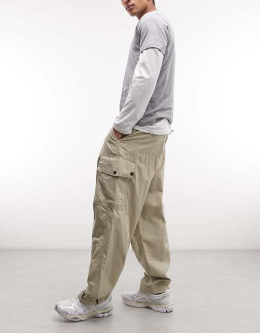 Alpha Industries cargo trousers with adjustable leg toggles in light beige, 3 of 5