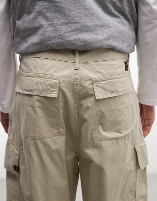 Alpha Industries cargo trousers with adjustable leg toggles in light beige, 5 of 5