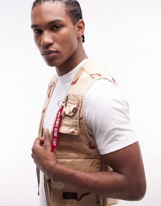 Alpha Industries - Chaleco utilitario con estampado de camuflaje y bolsillos de malla, 4 de 5