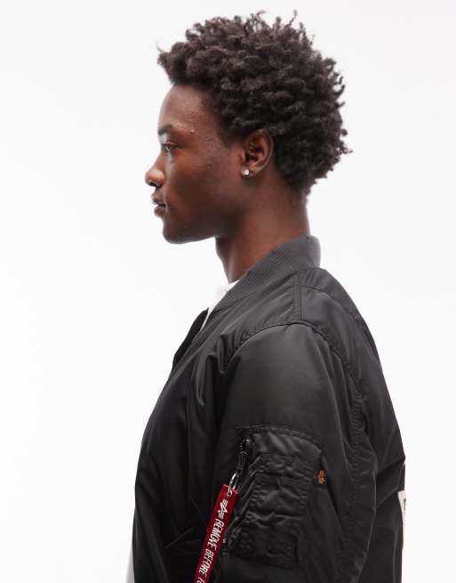 Alpha Industries – MA-1 – Bomberjacke in Schwarz mit Used-Optik und Logo am Rücken, 4 von 5