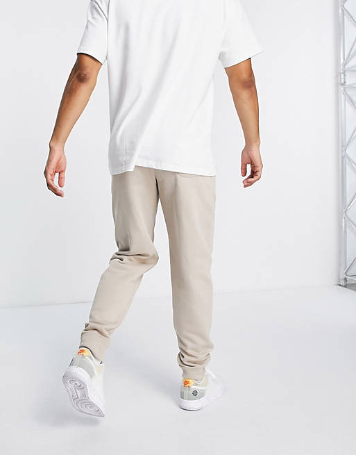  Alpha Industries Organics embroidered logo cuffed joggers in beige 