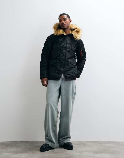 Alpha Industries - parka con capucha de piel sintética en negro - view 1