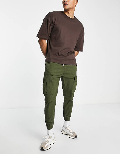 Alpha Industries ripstop cargo trackies in olive green | ASOS