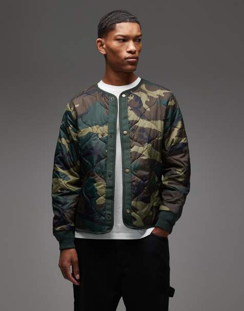 Alpha Industries – Studio – Kamouflagemönstrad, vadderad jacka med logga på ryggen - view 1