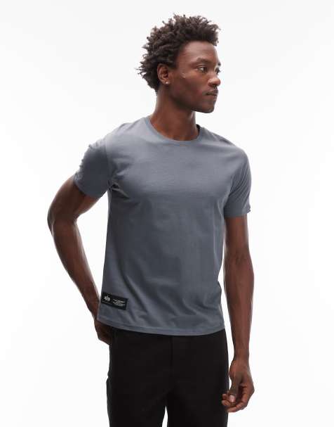 Alpha Industries - T-shirt met logo in poederblauw - view 1