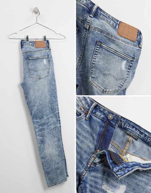 American Eagle destroy acid wash slim tapered fit jeans in destroyed medium wash